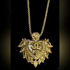 Upcycled 12K gold chain with CC charm.  Bling!